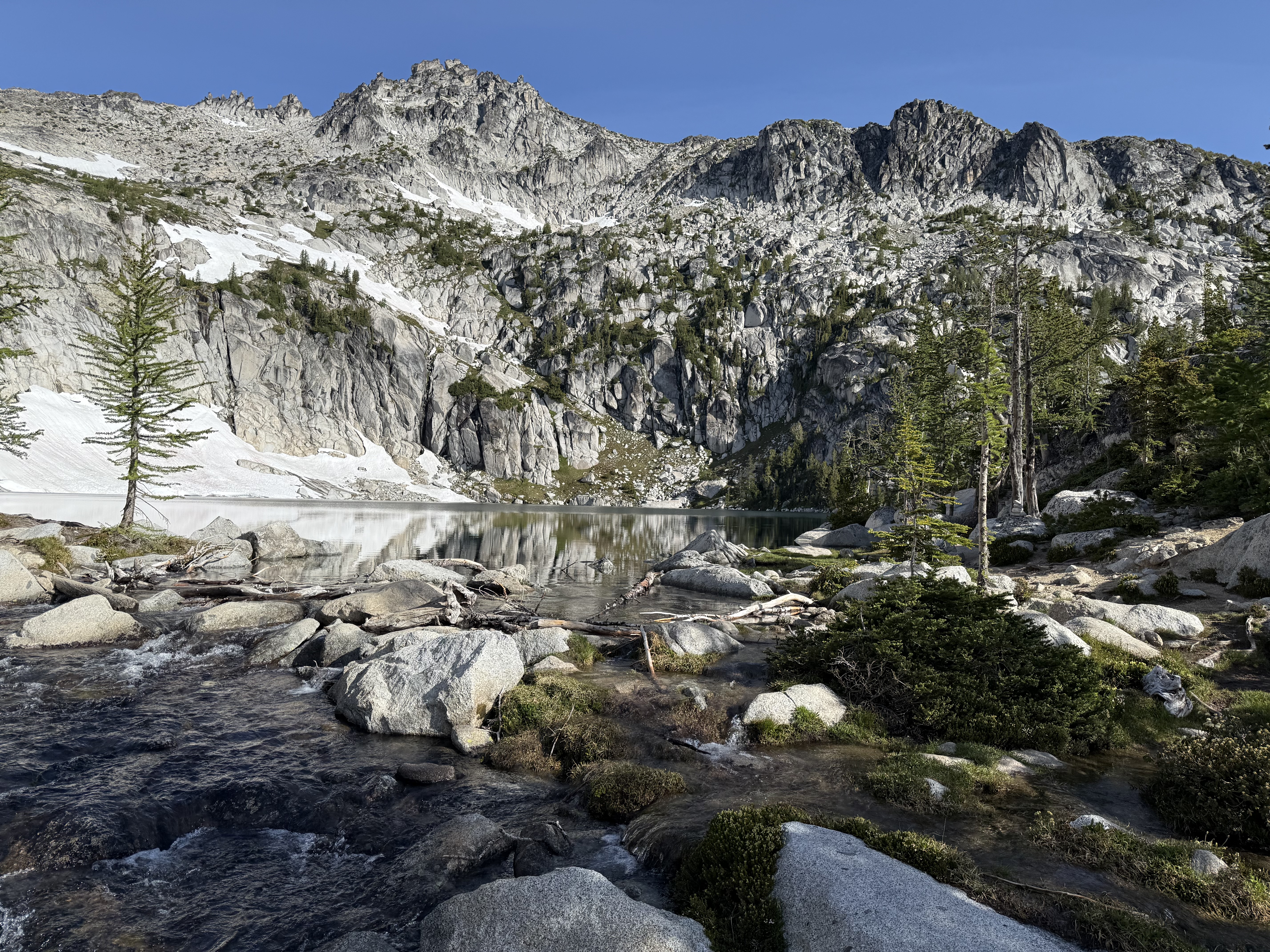 Stream flowing between Inspiration and Perfection Lakes with dramatic granite peaks