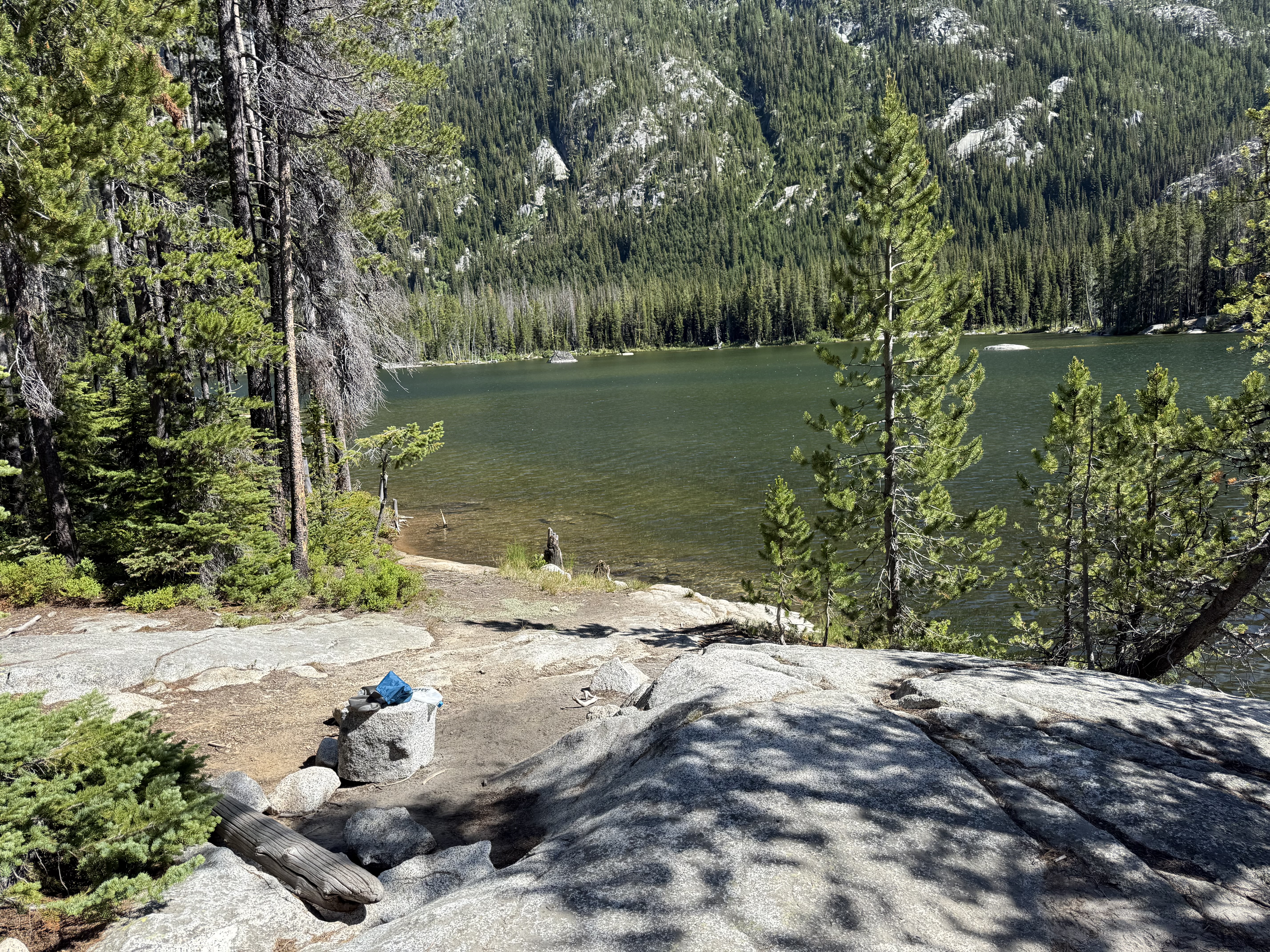 Snow Lake surrounded by forest and granite peaks, Day 2 camp
