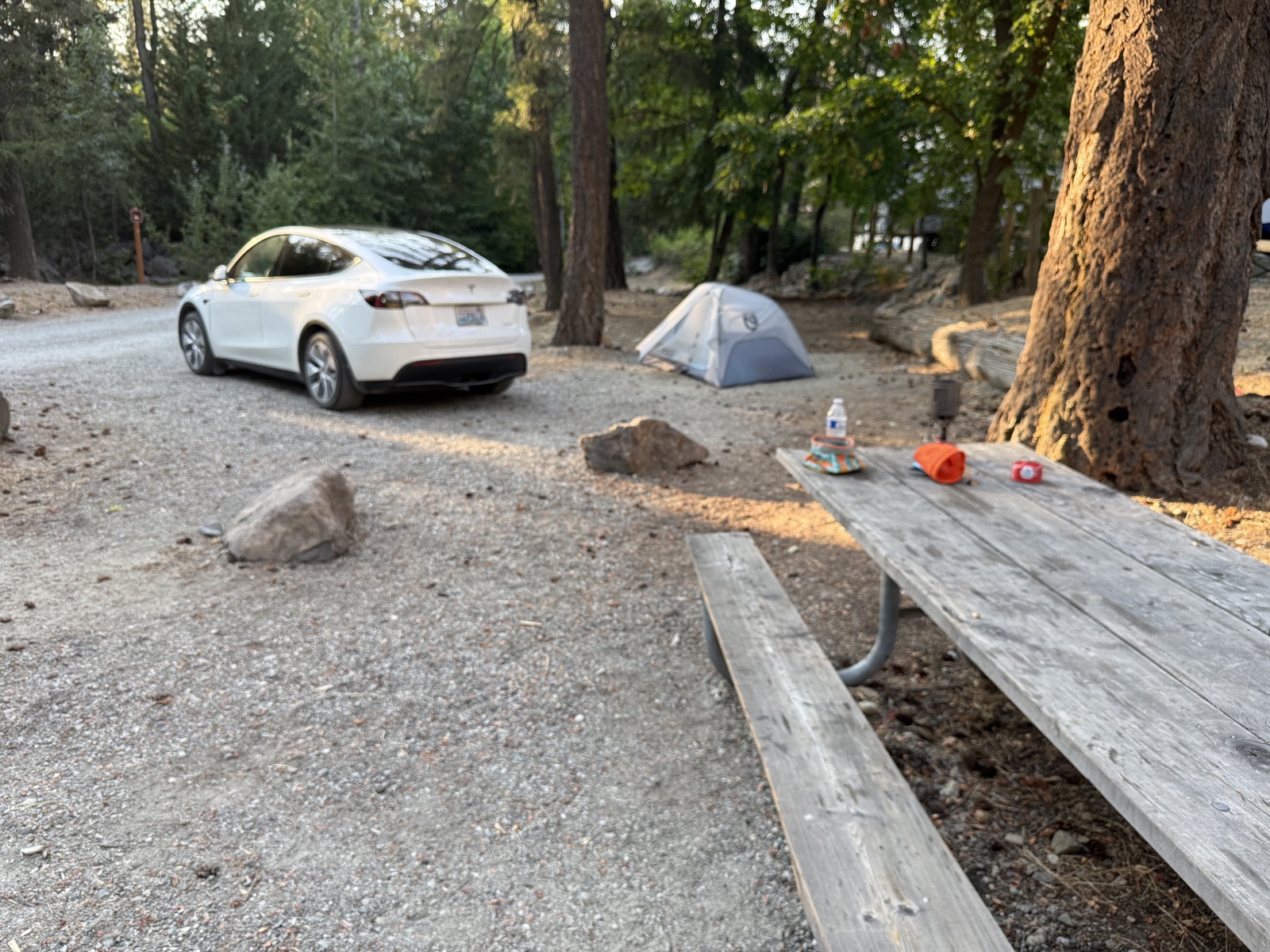 Campsite at Twenty-Five Mile Creek State Park with a tent, picnic table, and car