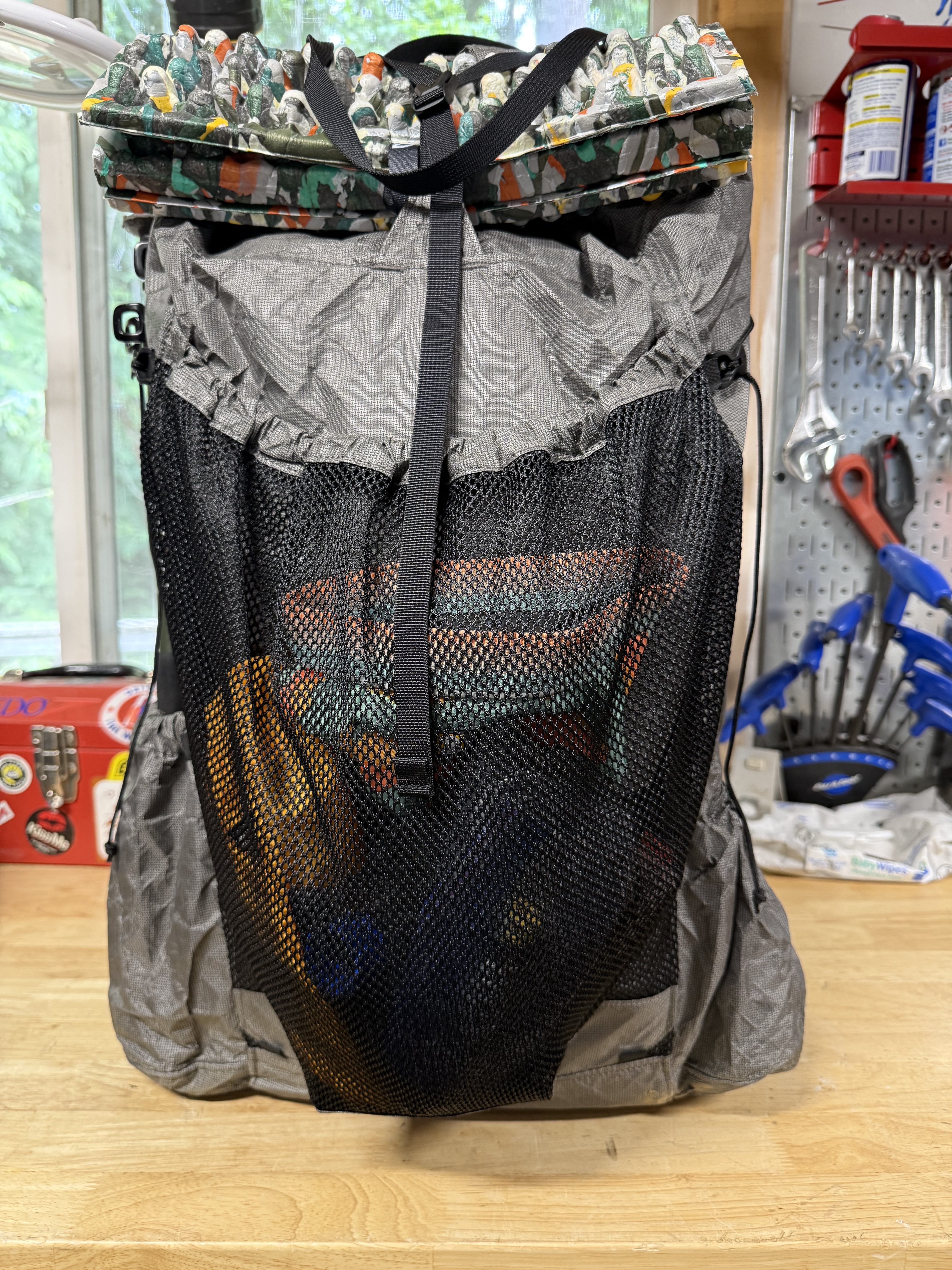 Front mesh pocket loaded with gear