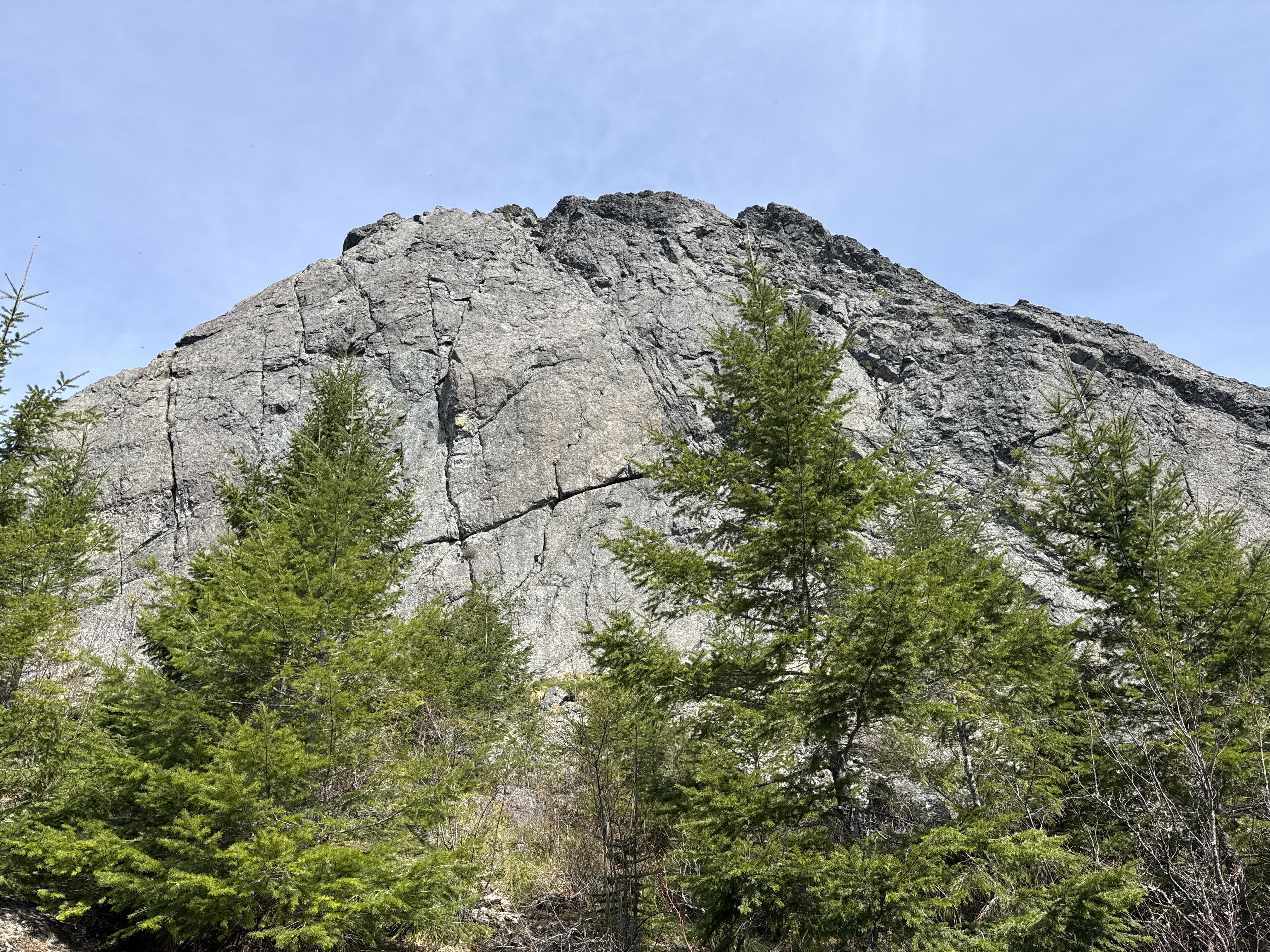 Looking up at the Mount Si Haystack rock formation from below